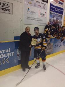 Laliberte receiving his monumental plaque. 